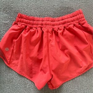 Red Lululemon running shorts